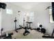 Home gym with weight bench and free weights at 2114 W Red Fox Rd, Phoenix, AZ 85085