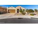 Single-story home with desert landscaping and a two-car garage at 21268 N 266Th Ln, Buckeye, AZ 85396