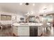 Large kitchen island with double sink and plenty of counter space at 21268 N 266Th Ln, Buckeye, AZ 85396