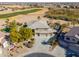 Aerial view of a house and surrounding neighborhood at 22155 N Cline Ct, Maricopa, AZ 85138