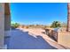 Spacious backyard with a built-in grill at 22155 N Cline Ct, Maricopa, AZ 85138