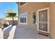 Home exterior with security door and welcoming mat at 22155 N Cline Ct, Maricopa, AZ 85138