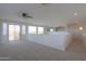 Bright and airy loft with large windows and carpet at 22155 N Cline Ct, Maricopa, AZ 85138