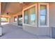 Covered patio with sliding glass doors and ceiling fans at 22155 N Cline Ct, Maricopa, AZ 85138