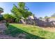 Spacious backyard with grassy area and mature trees at 2614 N 15Th St, Phoenix, AZ 85006