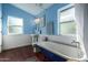 Classic bathroom with clawfoot tub and pedestal sink at 2614 N 15Th St, Phoenix, AZ 85006