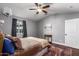 Cozy bedroom featuring a ceiling fan and large window at 2614 N 15Th St, Phoenix, AZ 85006