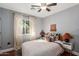 Charming bedroom with a polka dot bedding and ceiling fan at 2614 N 15Th St, Phoenix, AZ 85006