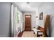 Bright entryway with wood floors, bench, and coat rack at 2614 N 15Th St, Phoenix, AZ 85006