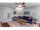 Living room with blue sofa, coffee table, and area rug at 2614 N 15Th St, Phoenix, AZ 85006