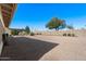 Expansive backyard with gravel and a wall at 2722 Leisure World --, Mesa, AZ 85206