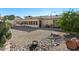 Large backyard with gravel landscaping and mature trees at 2722 Leisure World --, Mesa, AZ 85206