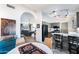 View of kitchen and dining area with gray cabinets at 2722 Leisure World --, Mesa, AZ 85206