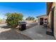 Covered patio with seating and built-in grill at 2722 Leisure World --, Mesa, AZ 85206