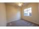 Bright bedroom with carpet flooring and double-door closet at 2740 S Honeysuckle Ln, Gilbert, AZ 85295