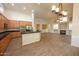 Open kitchen with island and stainless steel appliances at 2740 S Honeysuckle Ln, Gilbert, AZ 85295