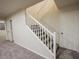 Modern staircase with white railings in a light-toned home at 2740 S Honeysuckle Ln, Gilbert, AZ 85295