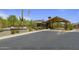 Trilogy community entrance with guardhouse and landscaping at 28219 N Needle Rock Ct, Rio Verde, AZ 85263