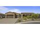 Beautiful single-story home with a two-car garage and landscaped front yard at 28219 N Needle Rock Ct, Rio Verde, AZ 85263