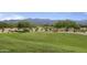 Landscaped golf course with mountain backdrop at 28219 N Needle Rock Ct, Rio Verde, AZ 85263