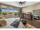 Main bedroom with sliding doors leading to the backyard and a dresser at 28219 N Needle Rock Ct, Rio Verde, AZ 85263