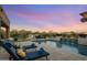 Luxury pool with fountains, fire features, and lounge chairs at 28219 N Needle Rock Ct, Rio Verde, AZ 85263