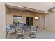 Covered patio with seating area, near pool at 2910 E Quiet Hollow Ln, Phoenix, AZ 85024