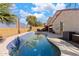 Backyard pool with patio and lounge chairs at 2910 E Quiet Hollow Ln, Phoenix, AZ 85024