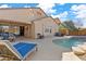 Pool and patio with lounge chairs and ping pong at 2910 E Quiet Hollow Ln, Phoenix, AZ 85024