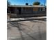 A fixer-upper home with a chain link fence and needs some repairs at 299 N Fresno St, Chandler, AZ 85225