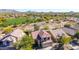 Aerial view showcasing the house and surrounding area at 3055 N Red Mountain Rd # 149, Mesa, AZ 85207