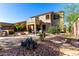 Spacious backyard with patio, firepit, and built-in grill at 3055 N Red Mountain Rd # 149, Mesa, AZ 85207