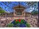 Elegant community entrance framed by wrought iron arch at 3055 N Red Mountain Rd # 149, Mesa, AZ 85207