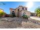 Two-story house with desert landscaping at 3055 N Red Mountain Rd # 149, Mesa, AZ 85207