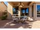 Covered patio with seating area and glass-top table at 3055 N Red Mountain Rd # 149, Mesa, AZ 85207