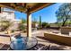 Covered patio with seating and a view of the desert at 3055 N Red Mountain Rd # 149, Mesa, AZ 85207