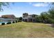 Large backyard featuring a grassy lawn and a swimming pool at 3606 W Le Marche Ave, Phoenix, AZ 85053