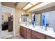 Double vanity bathroom with ample counter space at 3606 W Le Marche Ave, Phoenix, AZ 85053