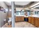 Bathroom with toilet and double vanity at 3606 W Le Marche Ave, Phoenix, AZ 85053