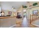 Elegant entryway with tiled floors and wooden staircase at 3606 W Le Marche Ave, Phoenix, AZ 85053