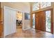 Bright entryway with stained glass window and hardwood door at 3606 W Le Marche Ave, Phoenix, AZ 85053