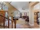 Entryway with tile floors, stained glass, and wooden staircase at 3606 W Le Marche Ave, Phoenix, AZ 85053