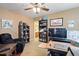 Spacious home office with built-in shelving and a view of the bathroom at 3606 W Le Marche Ave, Phoenix, AZ 85053