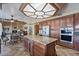 Kitchen with breakfast bar and stainless steel appliances at 3606 W Le Marche Ave, Phoenix, AZ 85053