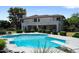 Inviting kidney-shaped pool with a diving board at 3606 W Le Marche Ave, Phoenix, AZ 85053