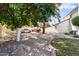 Landscaped side yard with gravel and a small grassy area at 3606 W Le Marche Ave, Phoenix, AZ 85053