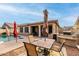 Enjoy outdoor dining and swimming in this home's private backyard with a built-in grill at 36248 W Cartegna Ln, Maricopa, AZ 85138