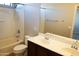 Bathroom with shower, tub, double vanity, and toilet at 36285 N Mirandesa Dr, San Tan Valley, AZ 85143