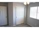 Bedroom with sliding door closet and window blinds at 36285 N Mirandesa Dr, San Tan Valley, AZ 85143