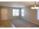 Living room with carpeted floor and neutral walls at 36285 N Mirandesa Dr, San Tan Valley, AZ 85143